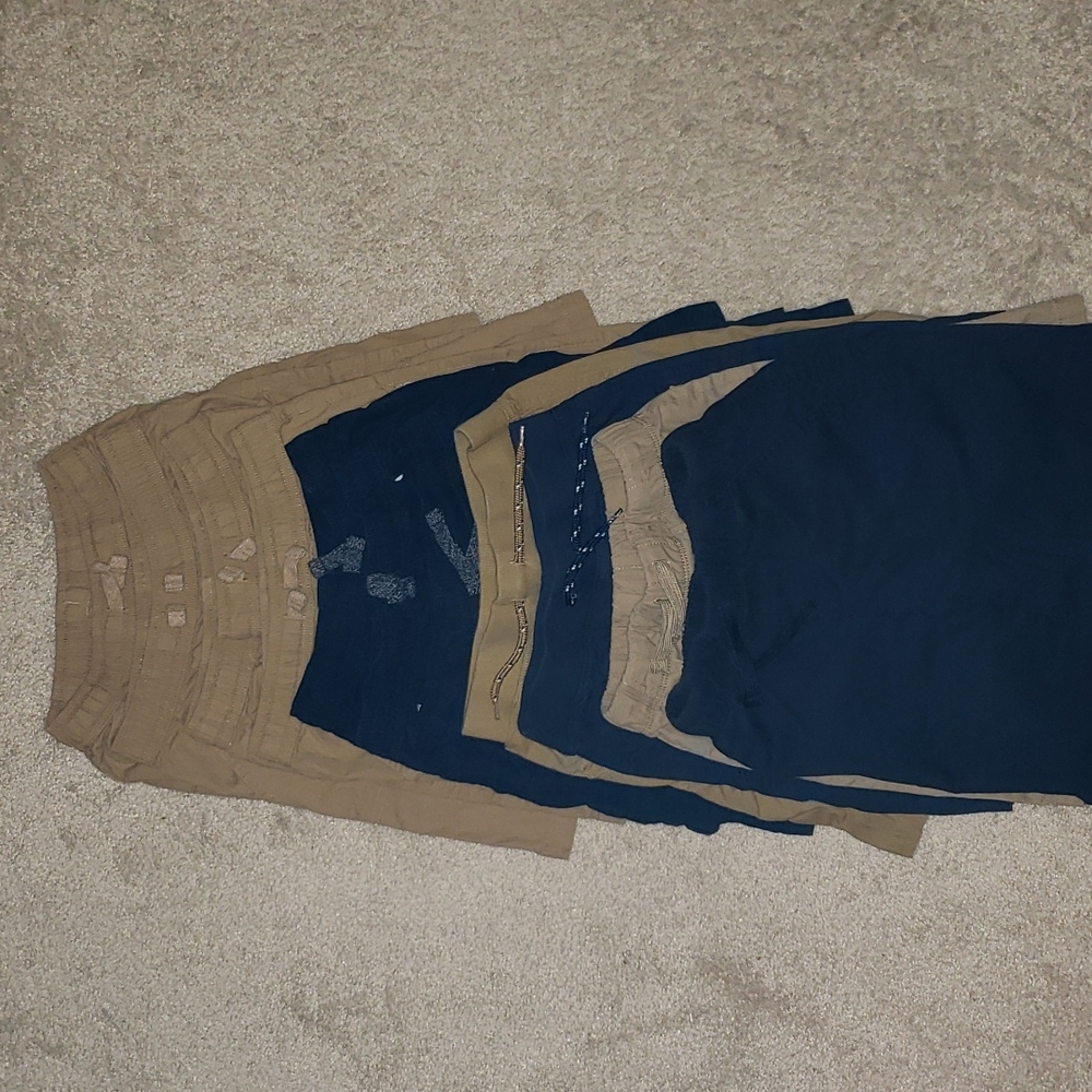 SOLD - 11 pairs of uniform shorts. Sold together.
